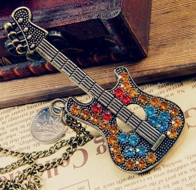 Win 1 of 5 CRYSTAL Guitar Necklaces