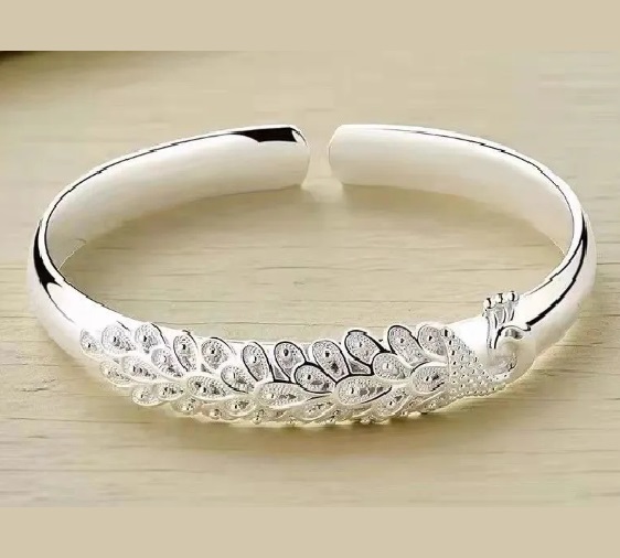 Win 1 of 4 SILVER Plated Peacock Bracelets. A dozen other Sweepstakes, Competitions or Contests goin